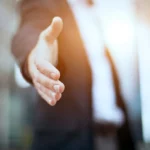 A Business Man offering a Handshake