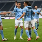 Manchester-City-players-celebrating-a-goal-during-a-Premier-League-game