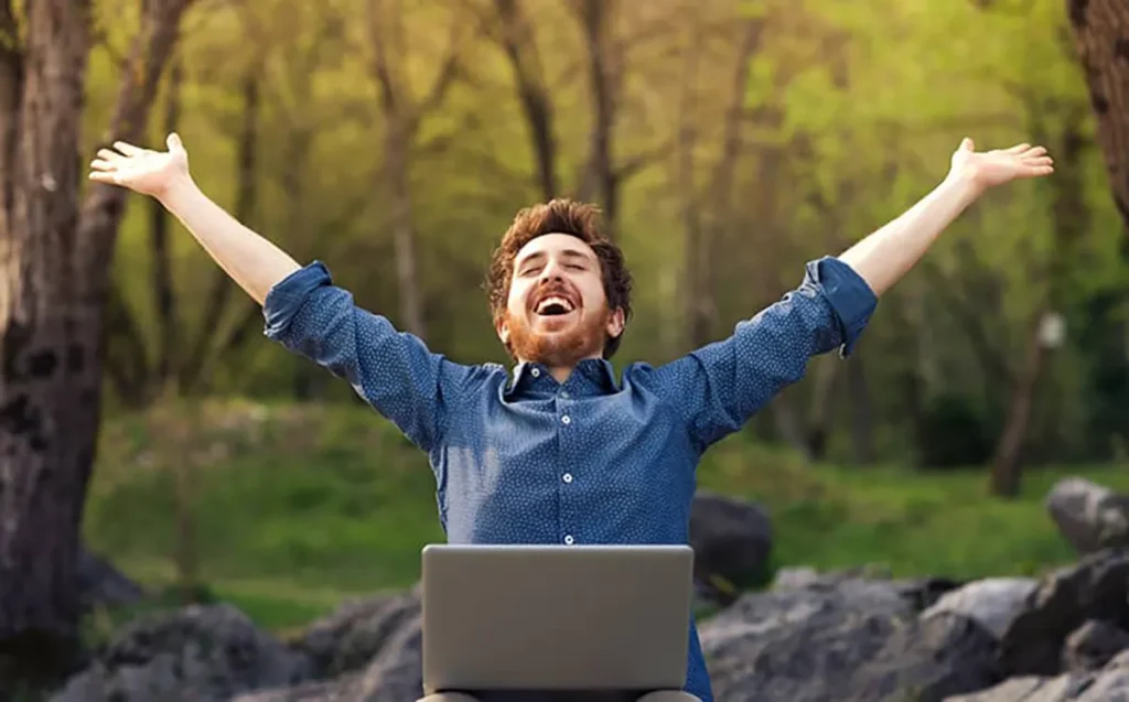 A direct seller celebrating after figuring out how to be financially independent with QNET