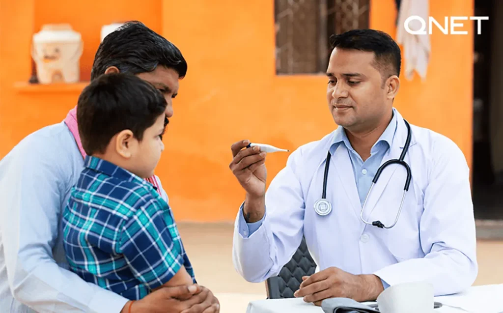 Doctor testing temperature