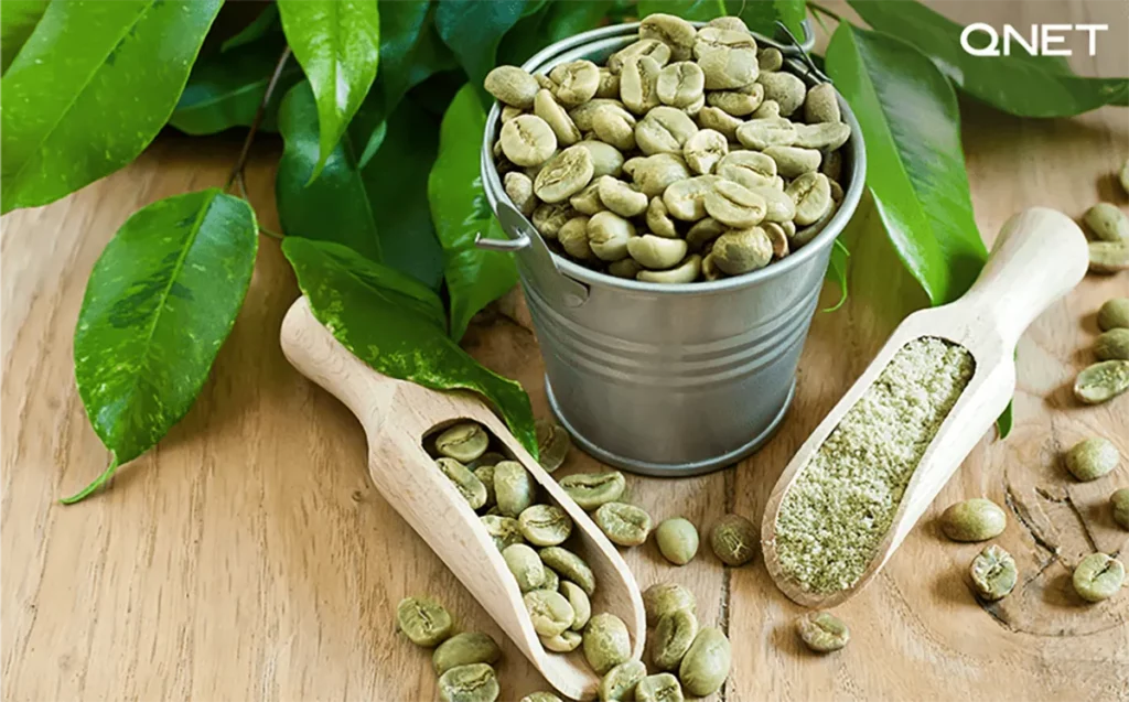 A can of green coffee beans on a table