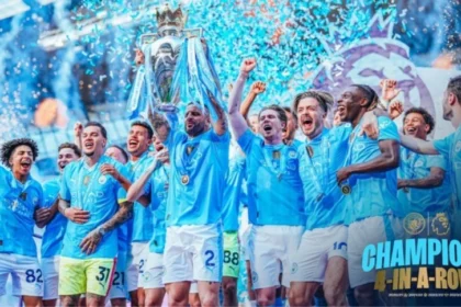 Manchester City squad celebrates their unprecedented fourth consecutive Premier League championship Four-In-A-Row